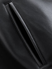 The Belted Faux-Leather Jacket — product photograph