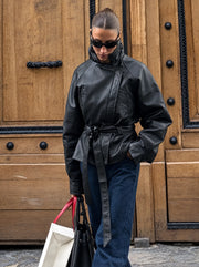 The Belted Faux-Leather Jacket — product photograph